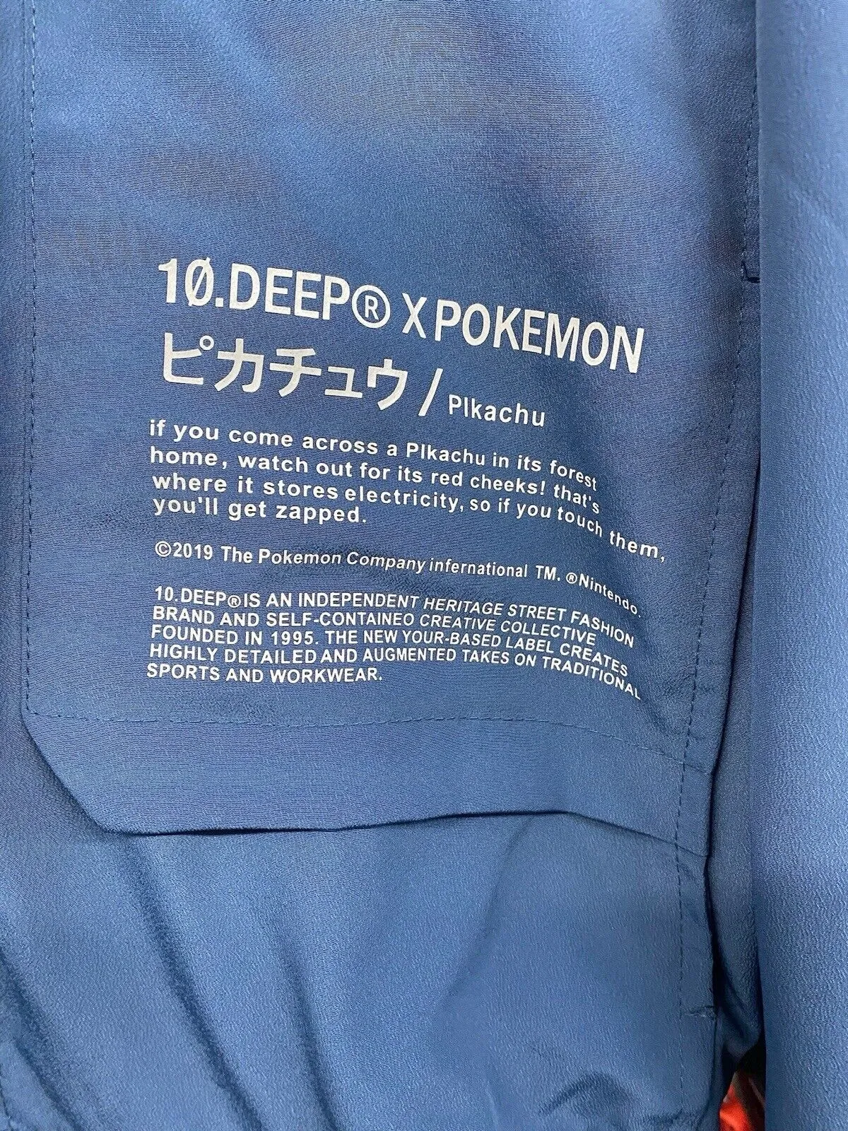 10.Deep X Pokemon Windbreaker Full Zip Hooded Jacket Mosshino Coutube Blue Sz M